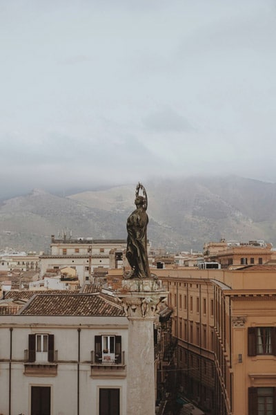 palermo statue and rooftops 400 600